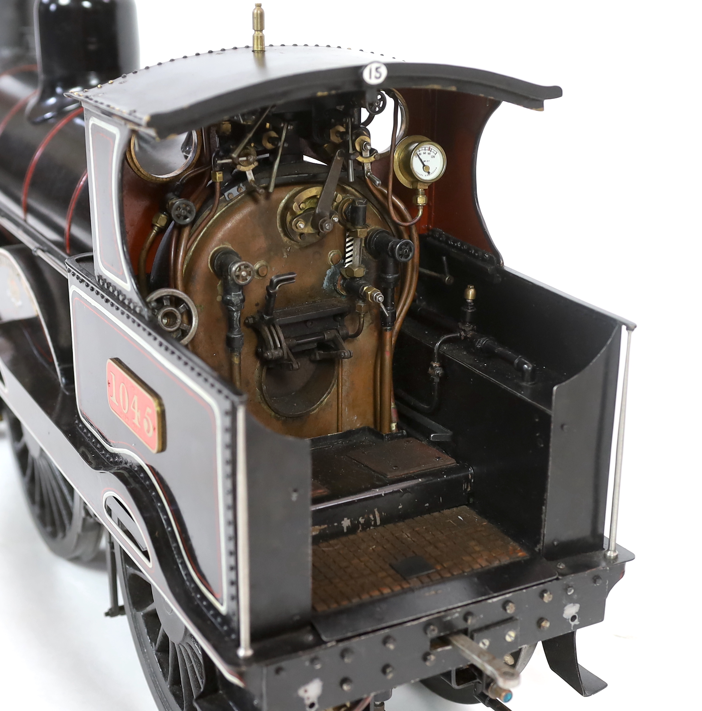 A very finely engineered scratch-built 5” gauge live steam model of a LNWR (London and North Western Railway) Jumbo 2-4-0 tender locomotive, No. 1045 ‘Whitworth’